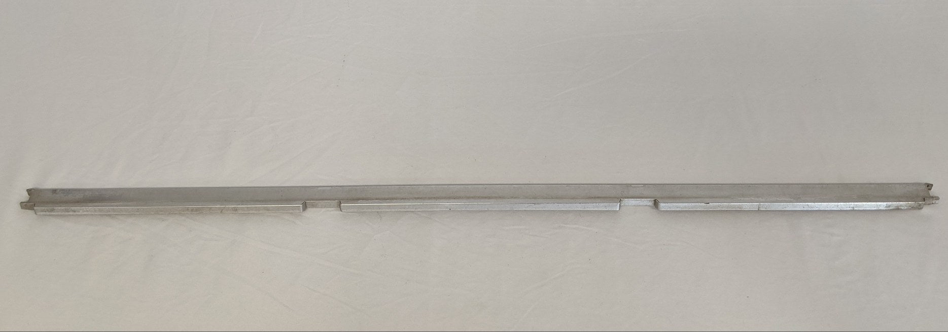 Used Freightliner FLD Classic 'Old Style' Grille Bar- P/N 18-21483-001 (10008088871228)