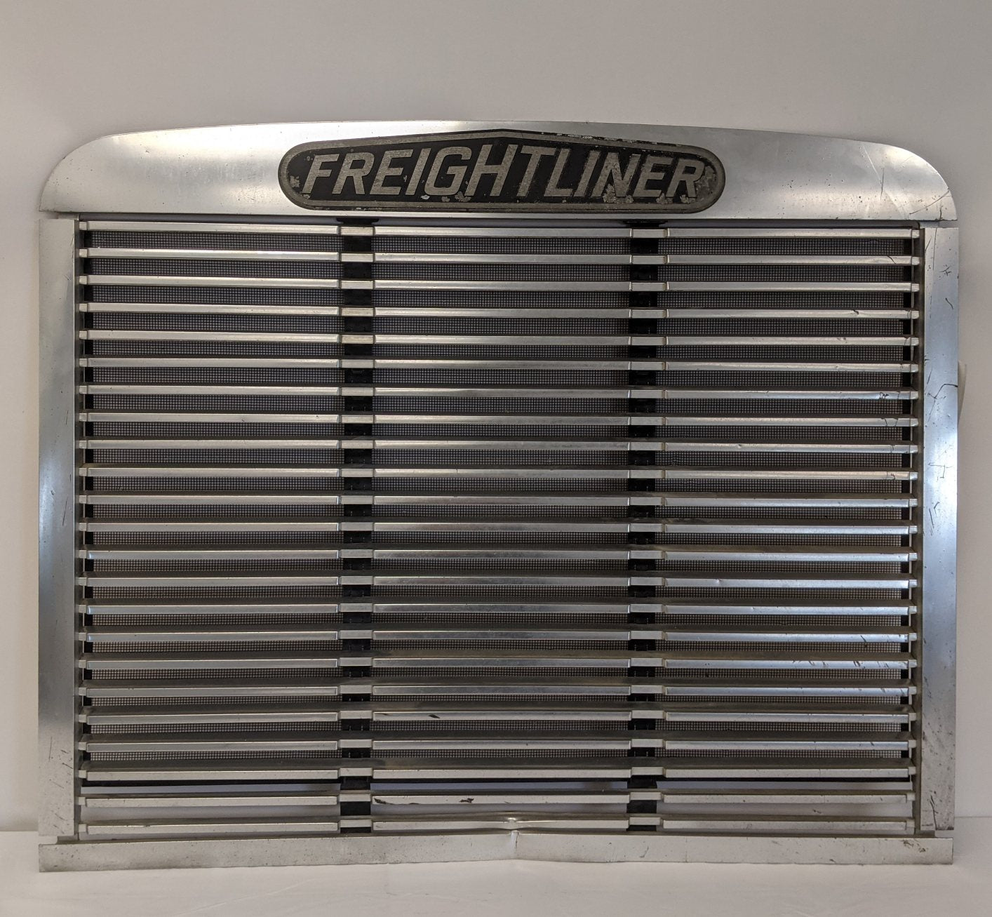*Dented* Freightliner FLD 112 'Old Style' Grille - P/N A17-12145-000 (10021343559996)