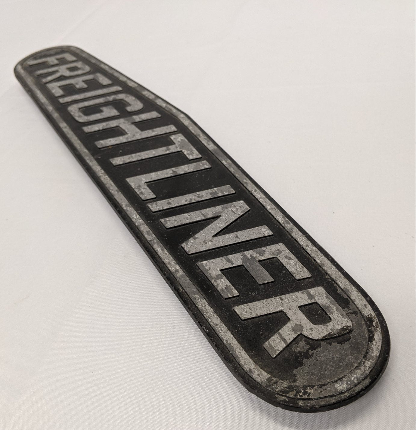 Damaged Freightliner 16 1/2" Nameplate Emblem - P/N 22-39676-002 (10032736862524)