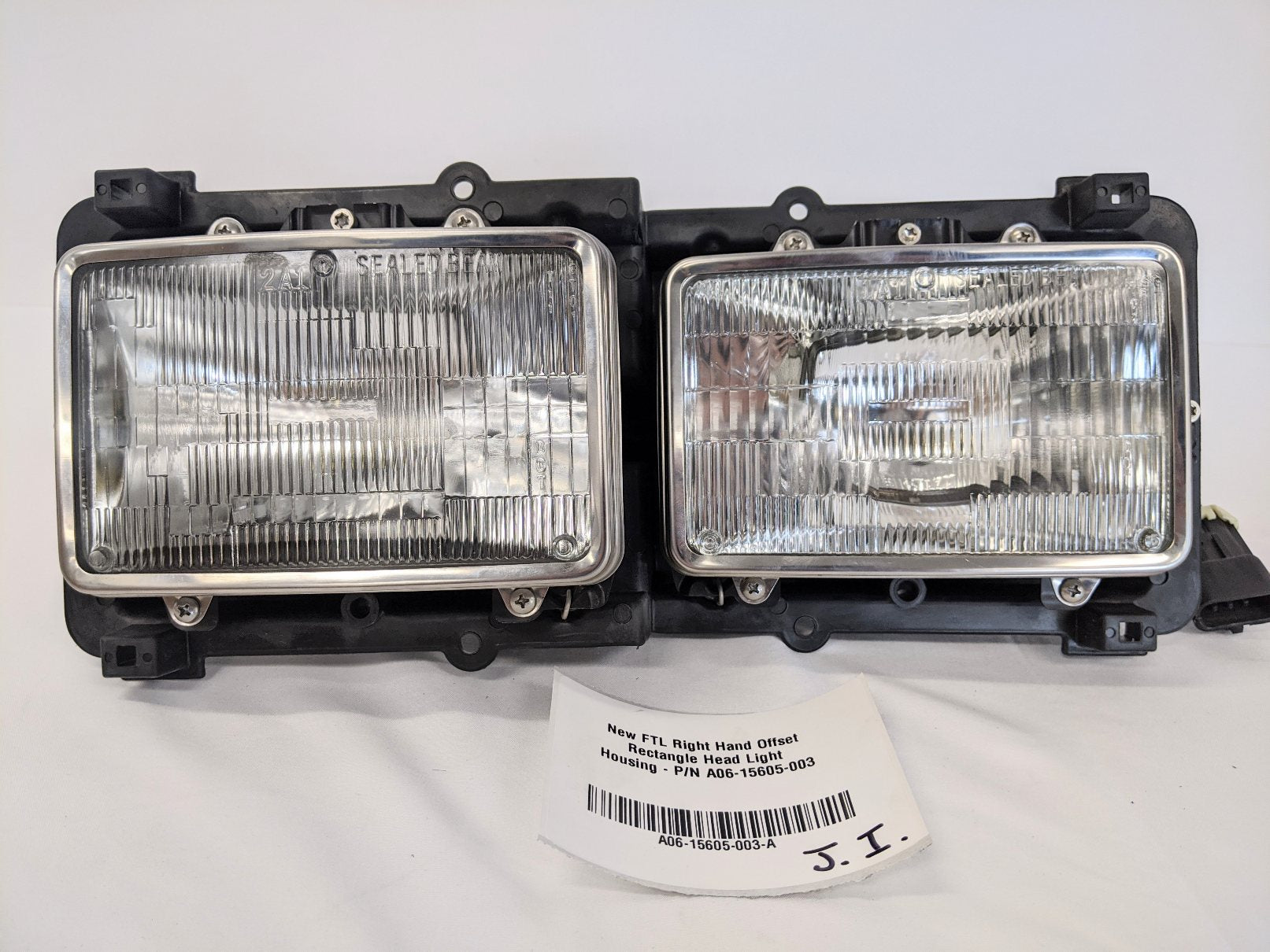New FTL Right Hand Offset Rectangle Head Light Housing - P/N A06-15605-003 (10162184782140)