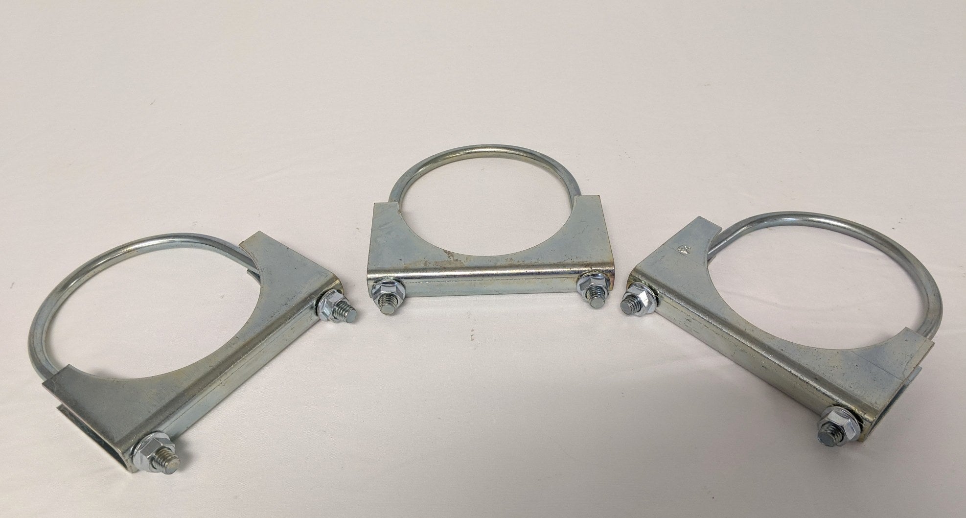 *Lot of 3* New Freightliner 4" U-Bolt Round Saddle Clamp - P/N 23-09289-003 (9879338647868)