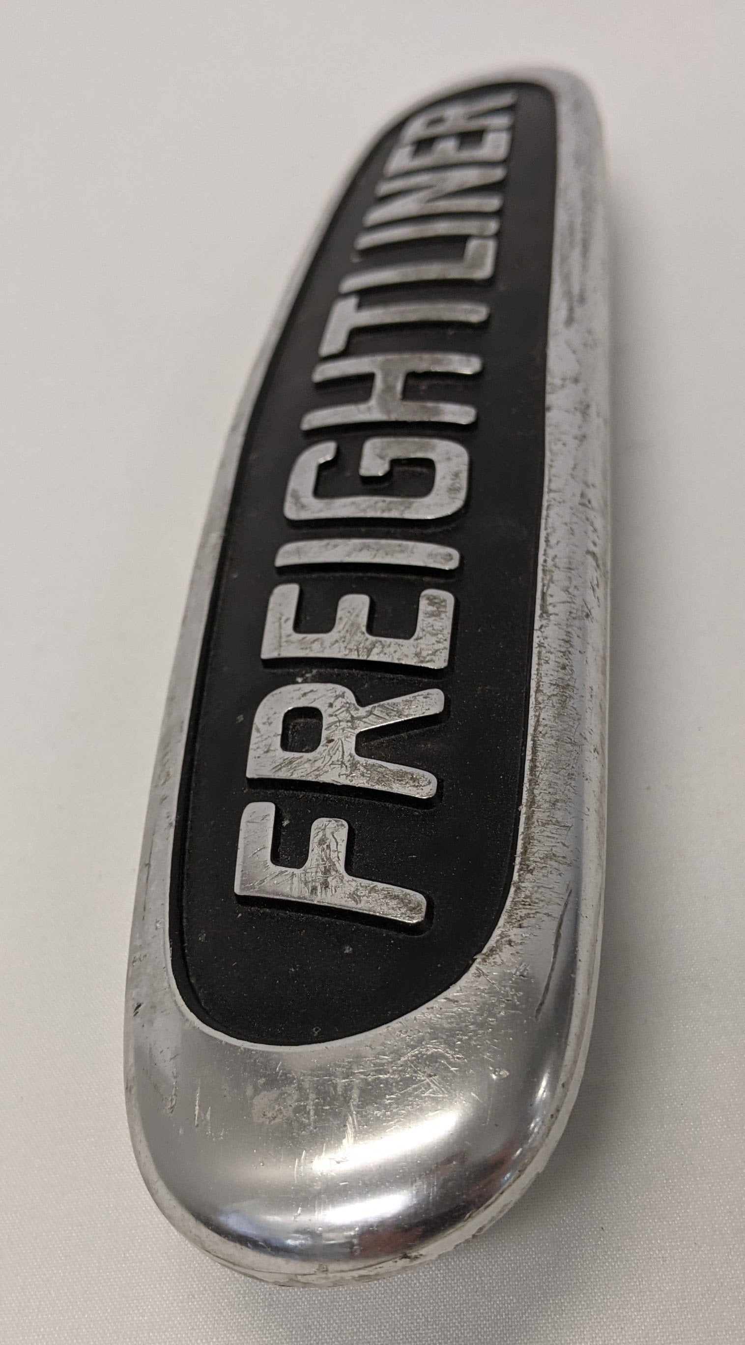 Used Freightliner 10 1/4" x 2 1/4" Aluminum Nameplate Emblem -P/N  22-45504-000 (10016233128252)