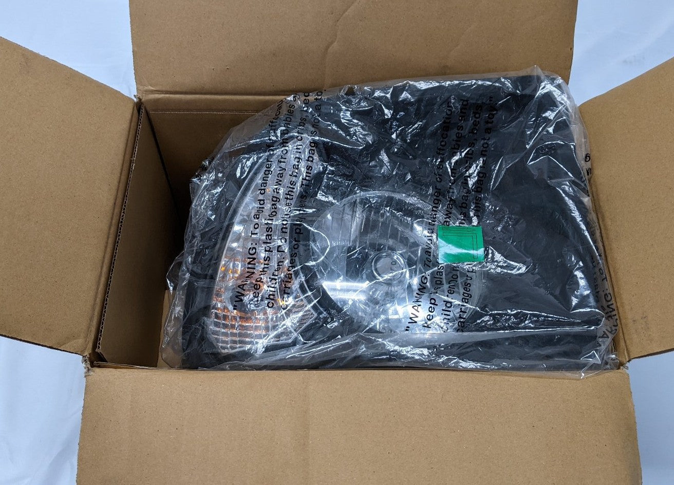 Freightliner 108SD 114SD SBA LH Black Bezel Headlight | A06-88632-004