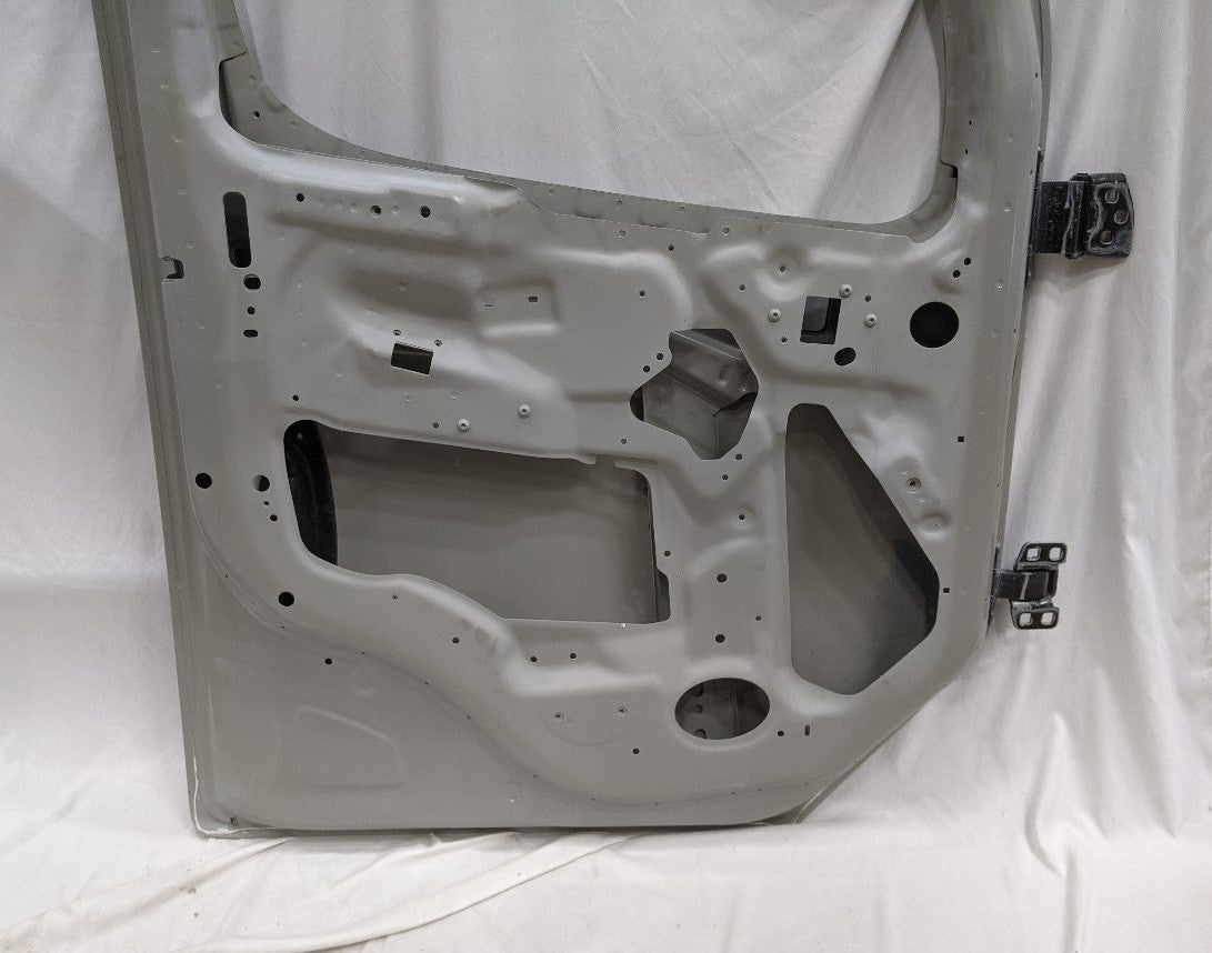 Damaged Freightliner M2 Plus LH (Driver's Side) Door (Bottom Corner Bent)