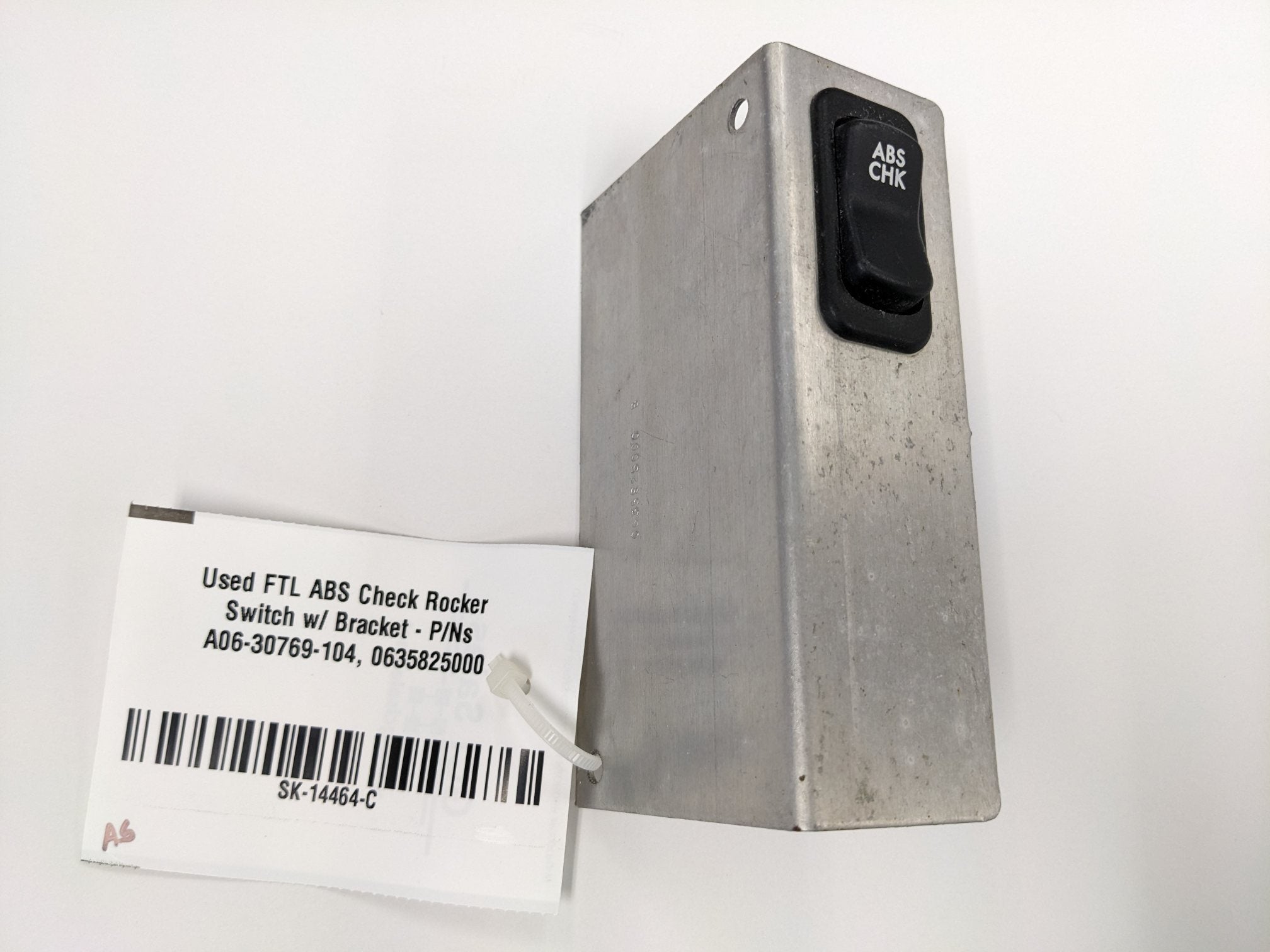 Used FTL ABS Check Rocker Switch w/ Bracket - P/Ns A06-30769-104, 0635825000 (10114274459964)