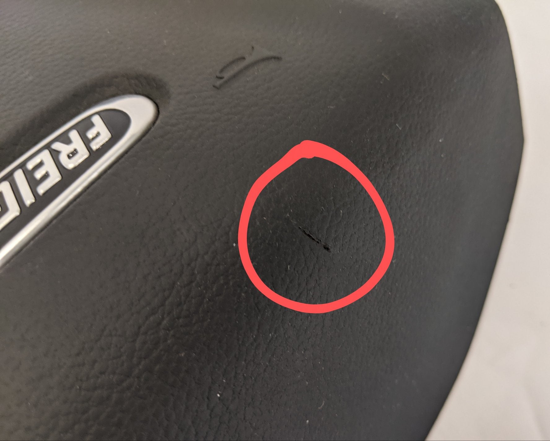 Damaged Freightliner Steering Wheel Center Cover Only for A14-19622-000 (10127972794684)