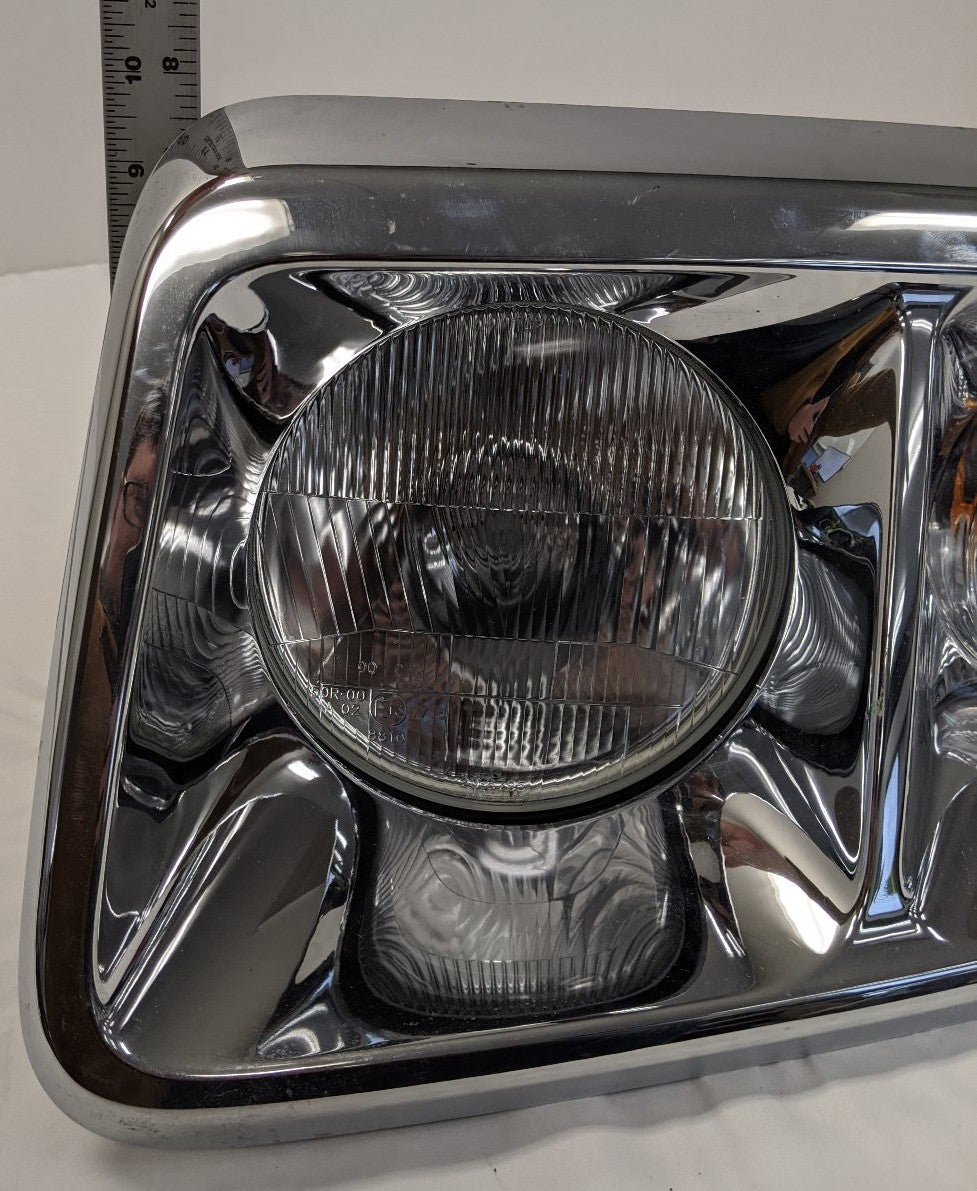 Damaged Freightliner Coronado SD122 LH Chrome Head Light - P/N A06-88646-000