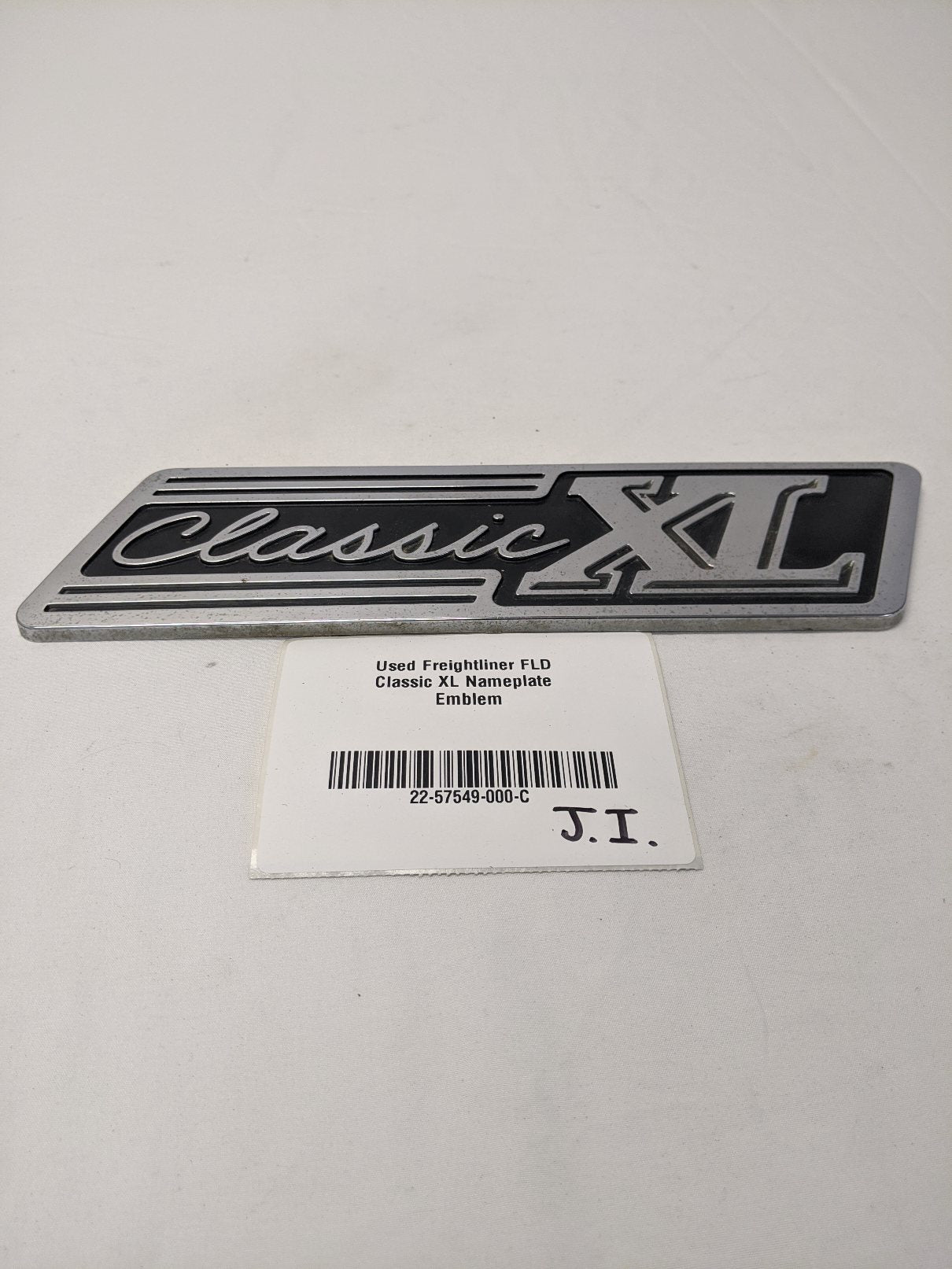 Used Freightliner FLD Classic XL Nameplate Emblem - P/N 22-57549-000