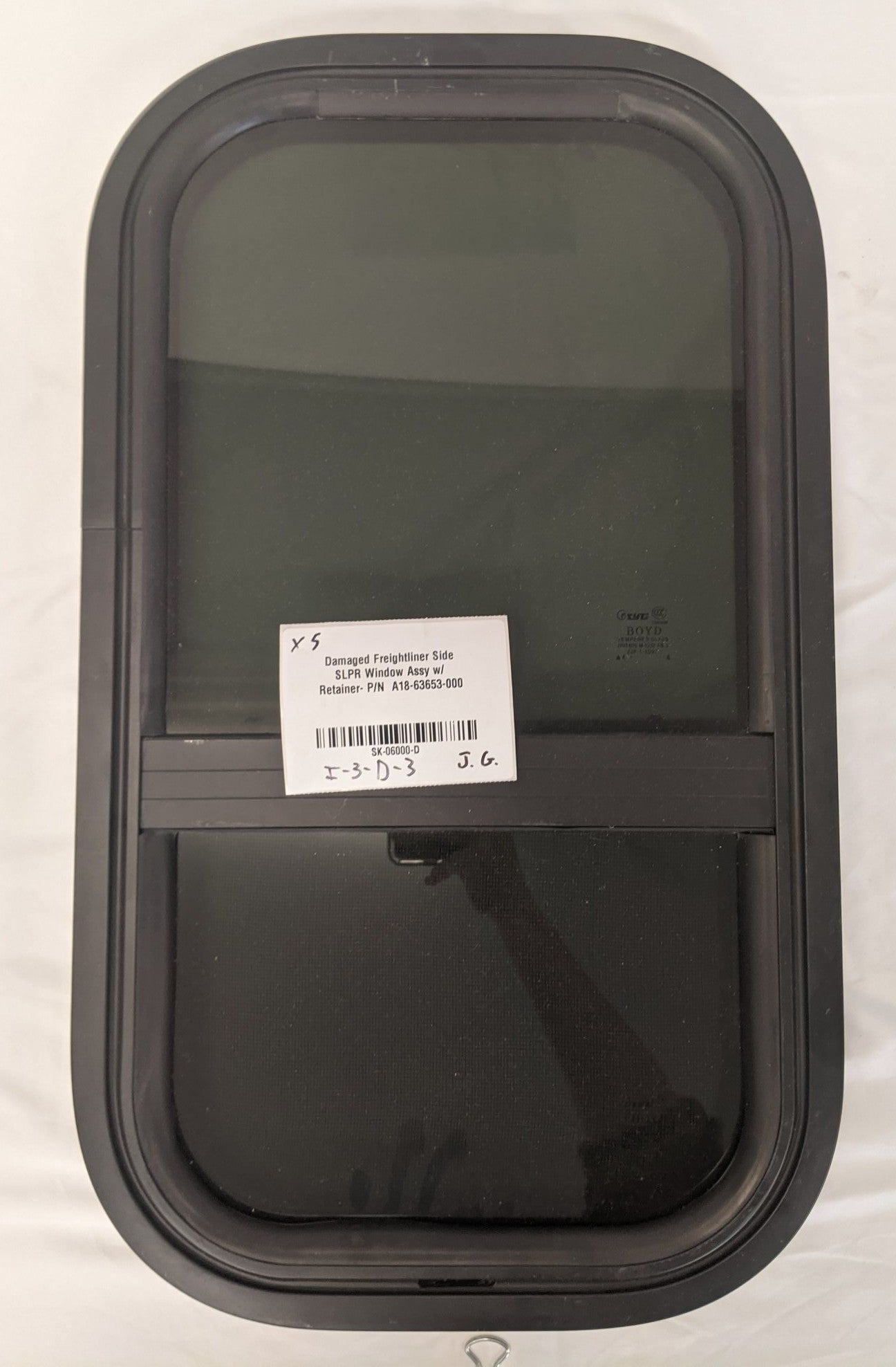 Damaged Freightliner Side SLPR Window Assy w/ Retainer- P/N  A18-63653-000