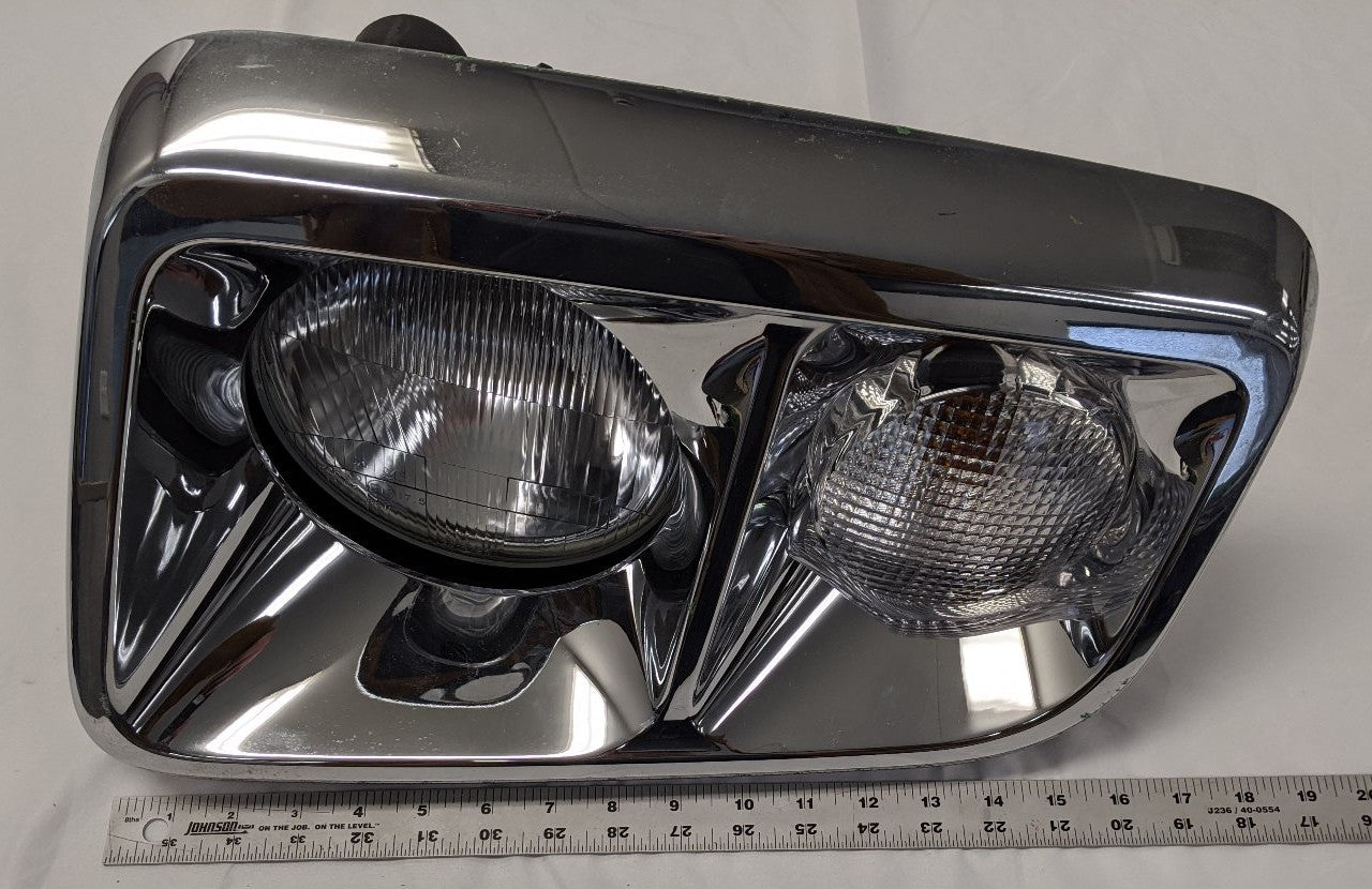Damaged Freightliner Coronado SD122 LH Chrome Head Light - P/N A06-88646-000