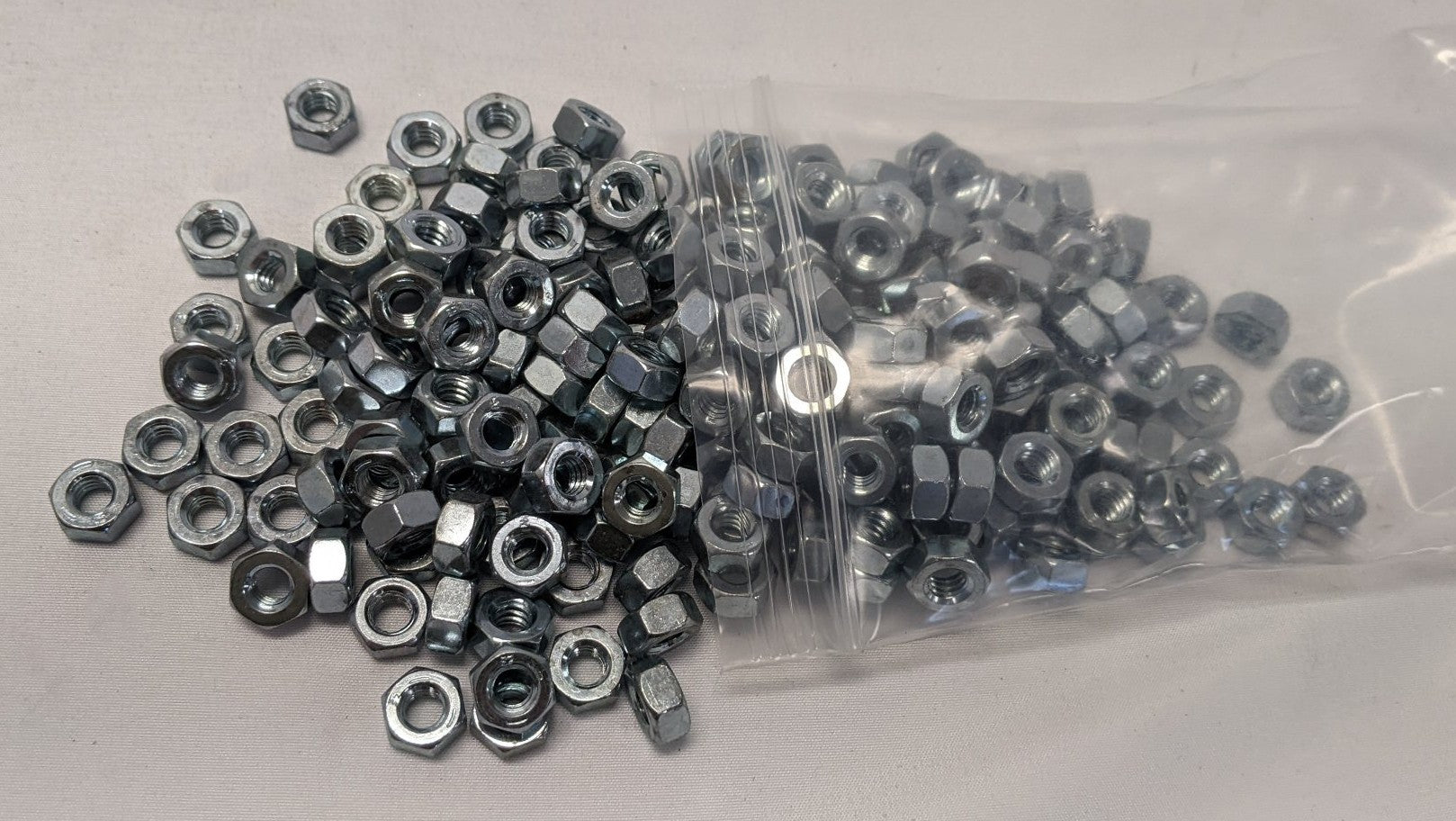*Lot of 200* New 1/4"-20 Coarse Grade 5 Steel Nuts