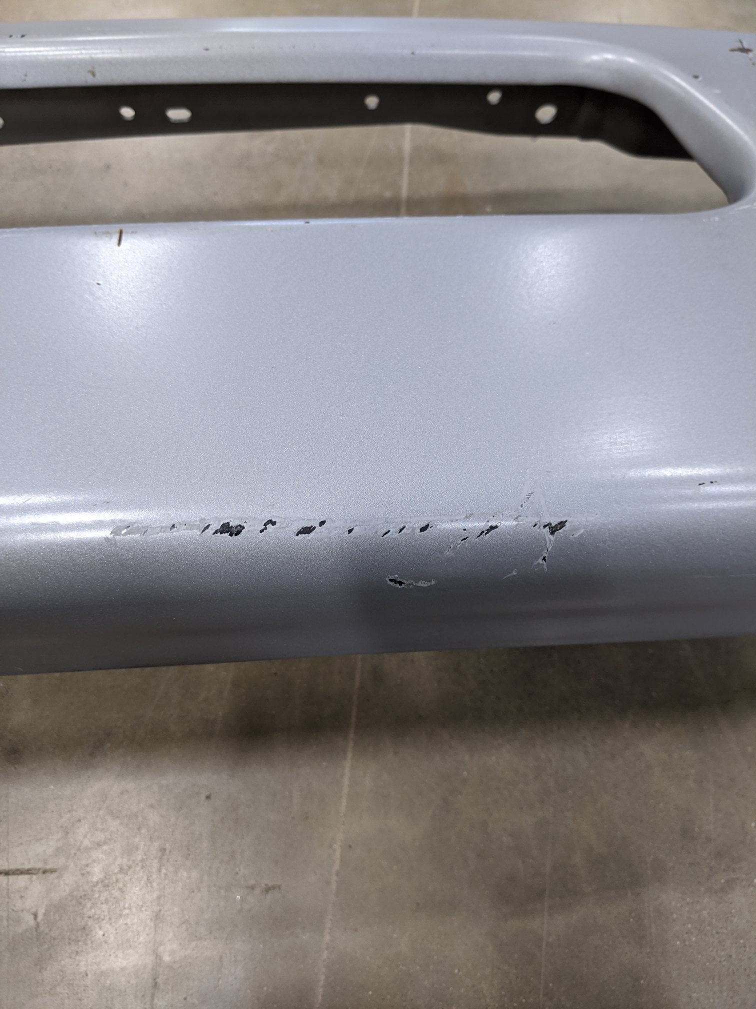 Damaged Freightliner M2 Argent Silver Center Bumper - P/N  A21-28177-006 (9073702764860)