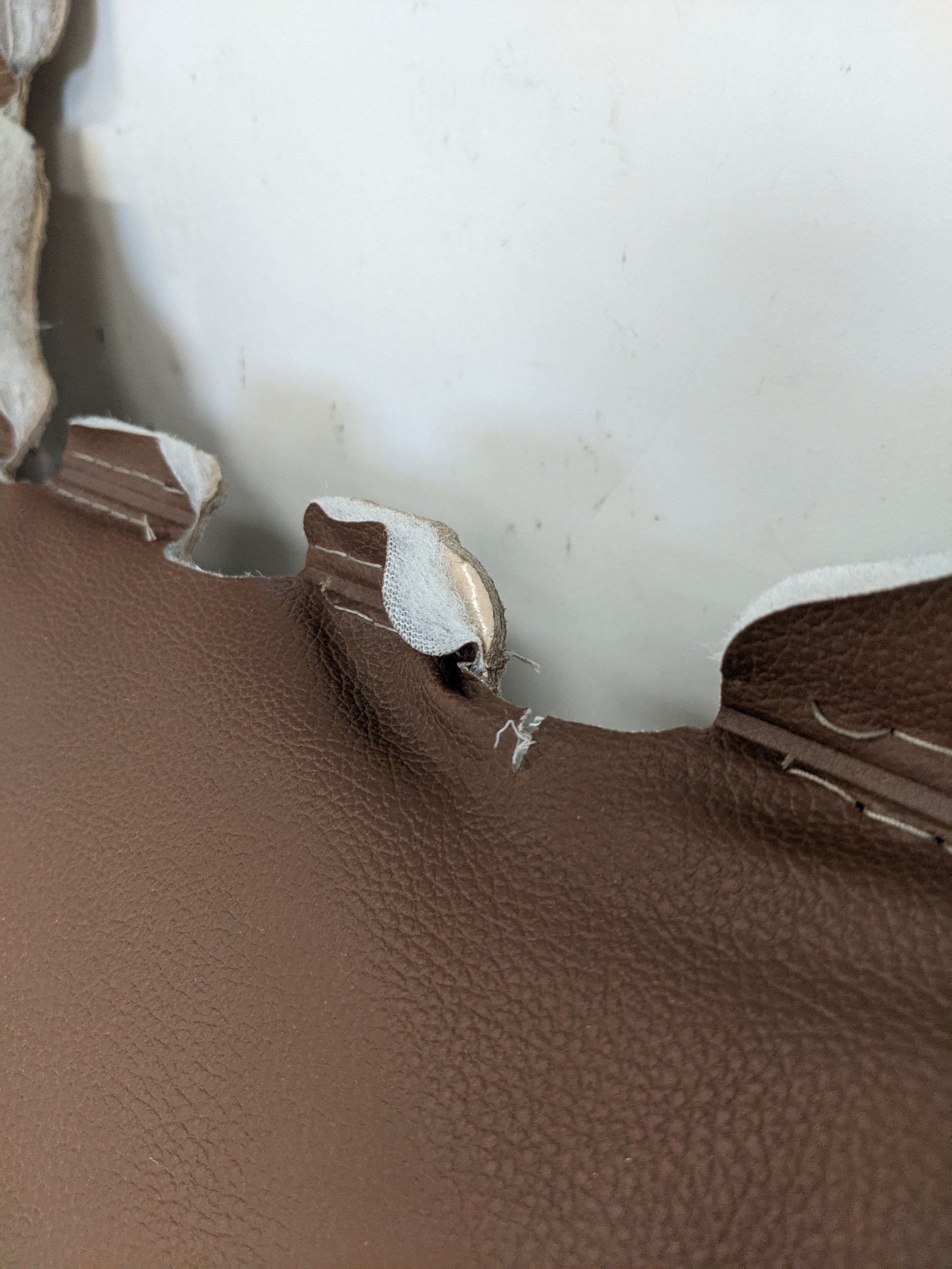 Damaged Freightliner RH Brown TV Arm Upholstery Trim - P/N  A18-69091-701 (8365595820348)