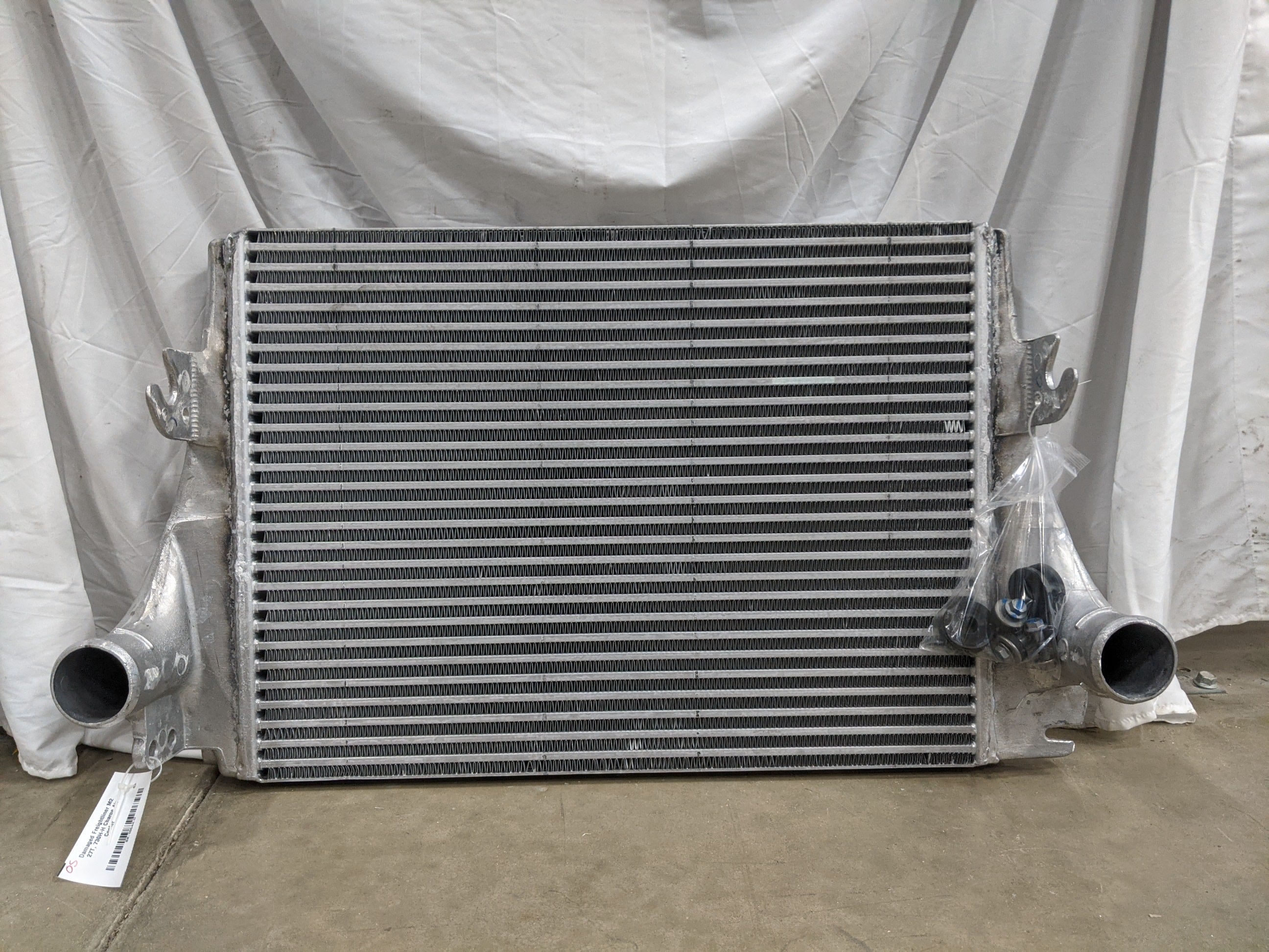 Damaged Freightliner M2 28 5/8" x 21 7/8" 27T Charge Air Cooler  - P/N  01-32211-000 (8418425897276)