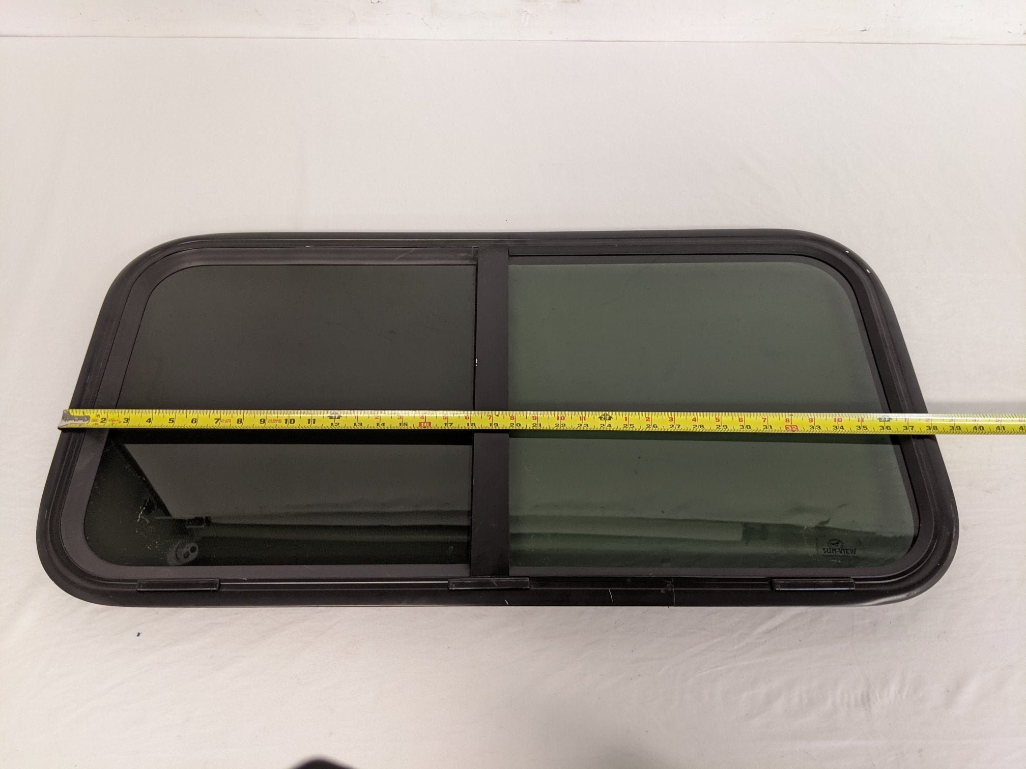 Damaged Freightliner Rear Sleeper Window Assembly - P/N 22-68610-000 (9099605115196)