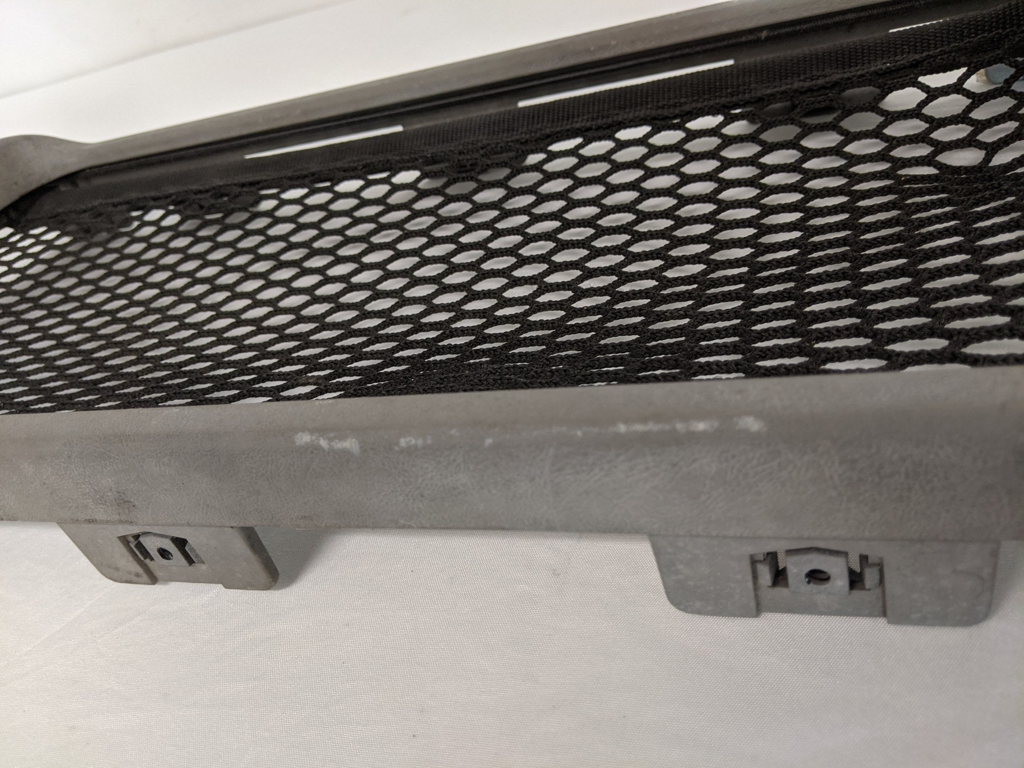 Used Freightliner Columbia Storage Cabinet Fascia w/ Netting - P/N A18-33389-007 (9746269602108)