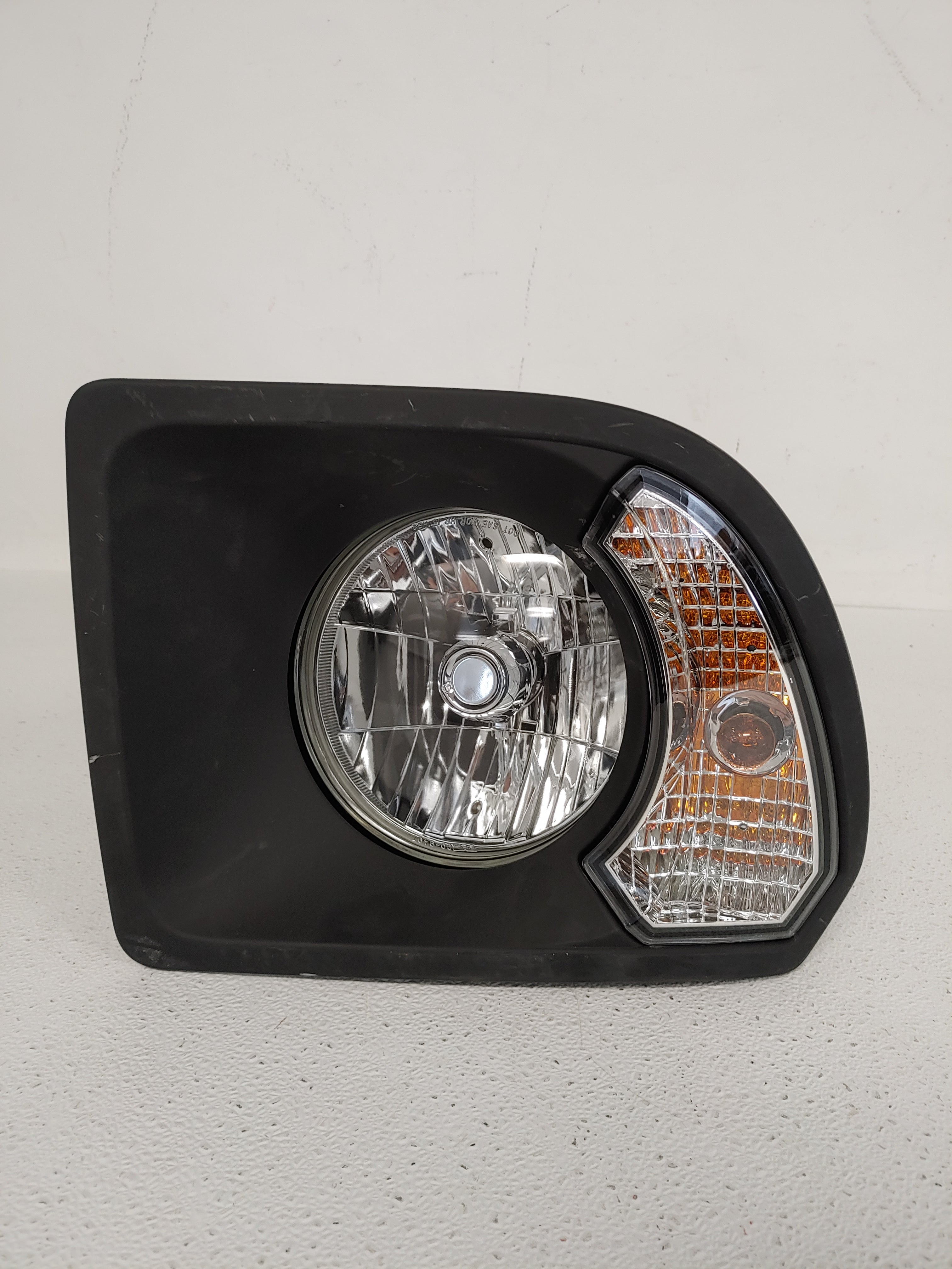 Damaged Freightliner RH Black Bezel Headlamp - P/N  A06-88632-005 (6825746202710)