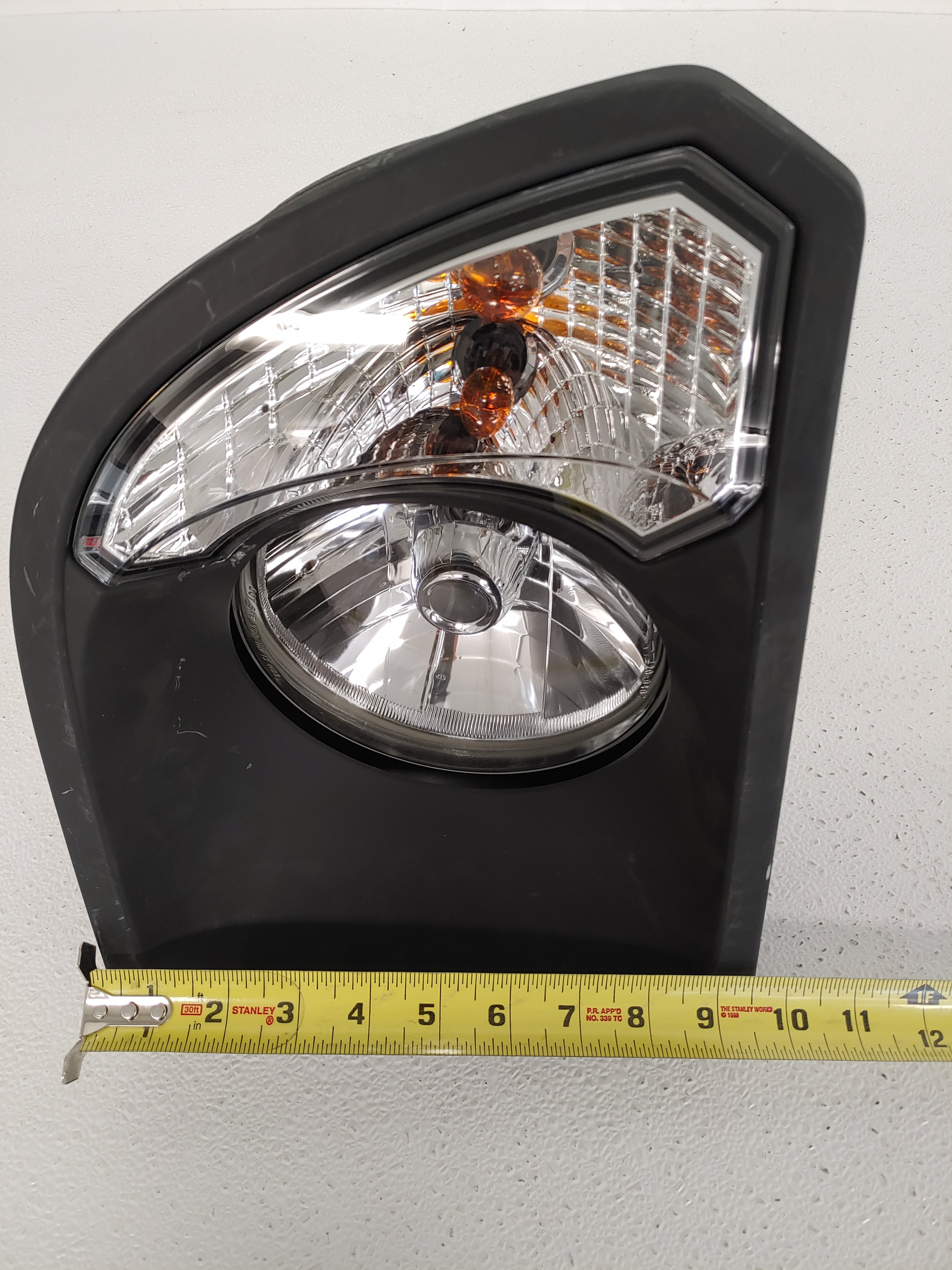 Damaged Freightliner RH Black Bezel Headlamp - P/N  A06-88632-005 (6825746202710)